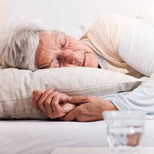 Elderly woman with drugs in bed Elderly woman with drugs in bed